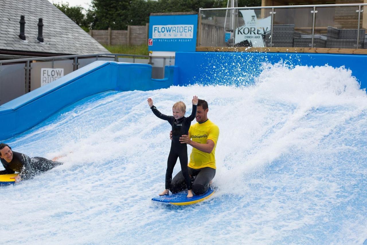 Retallack Resort & Spa Пэдстоу Экстерьер фото A child learning to surf on the FlowRider